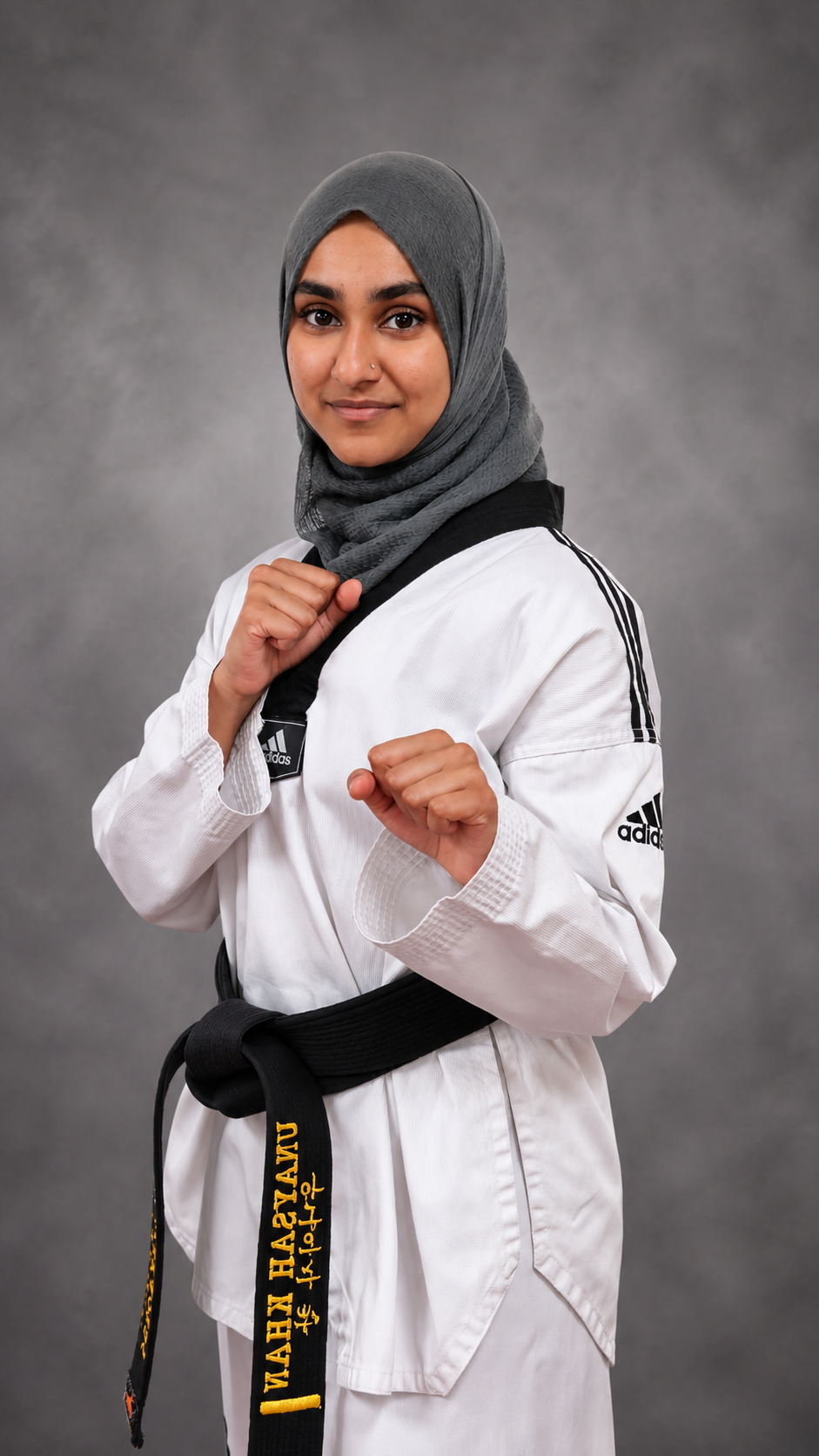 Ms. Khan in her Taekwondo uniform